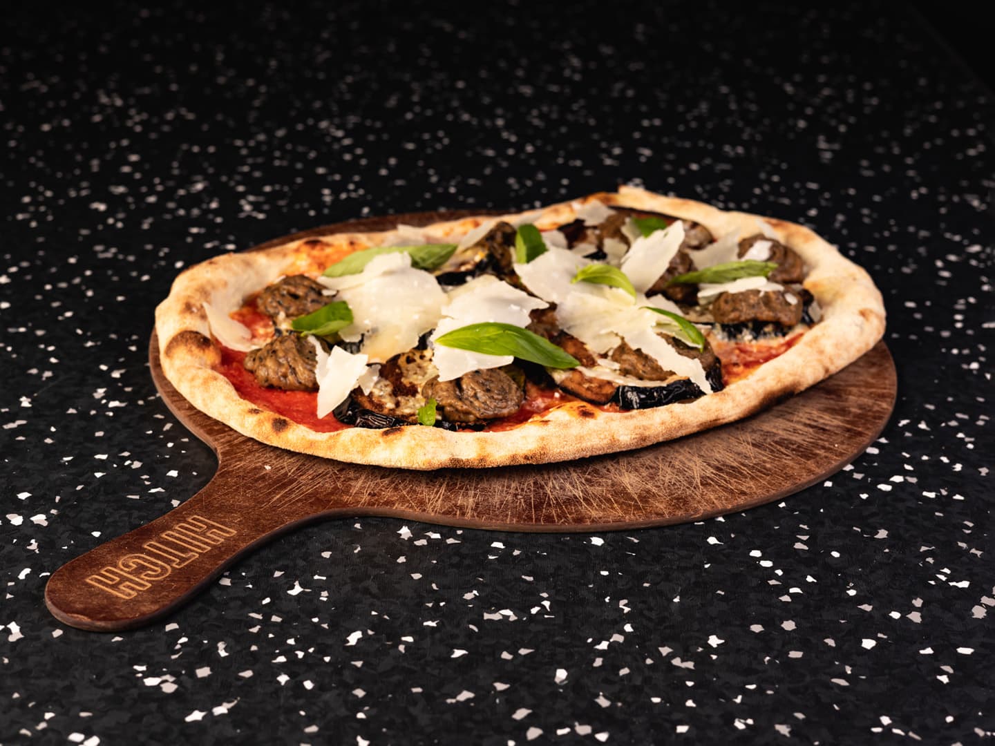 <p>Whole wheat dough, tomato sauce, eggplant, baba ganoush, parmesan and basil</p>