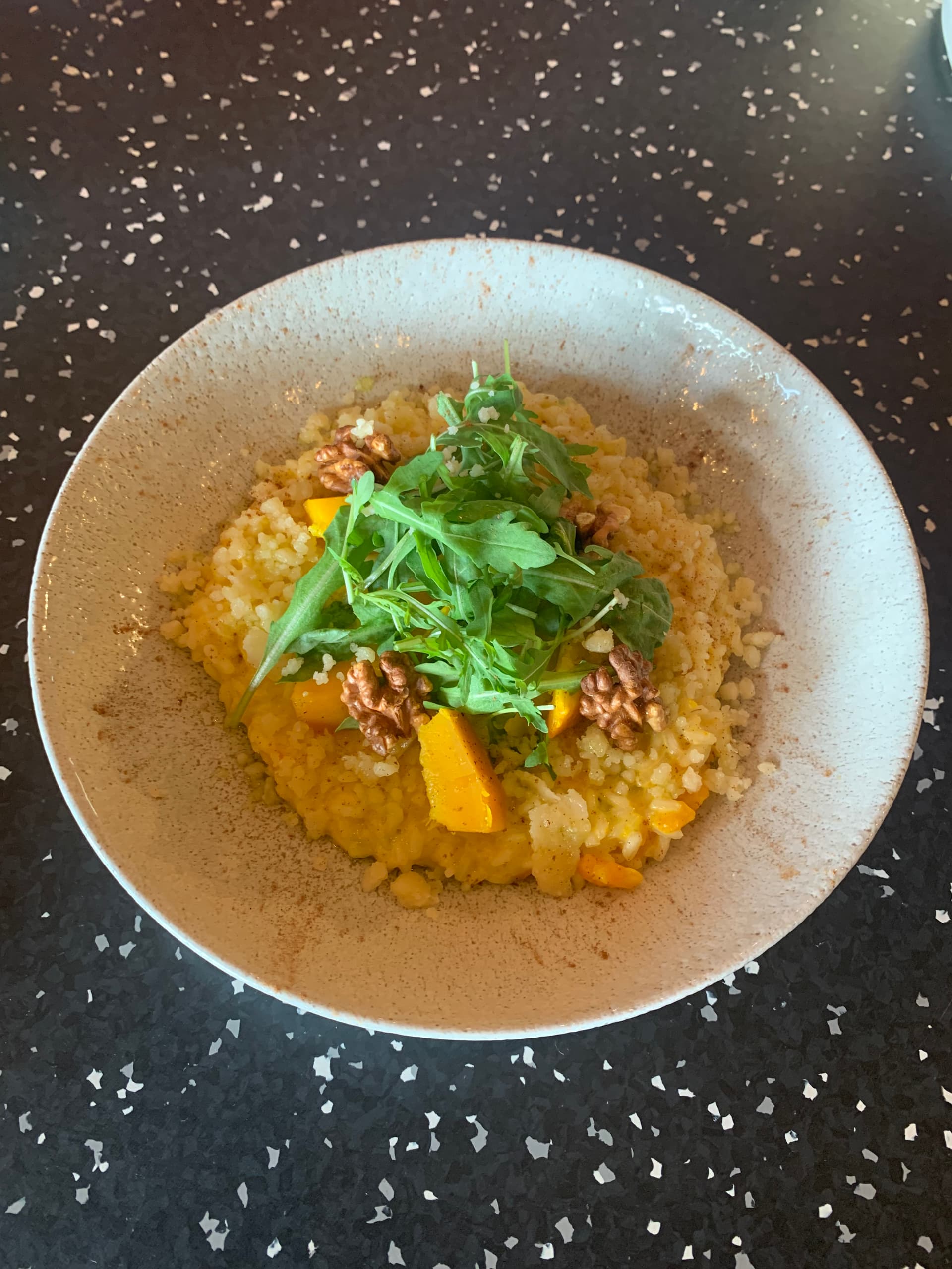 <p>Pumpkin risotto with rucola, parmesan &amp; walnut</p>