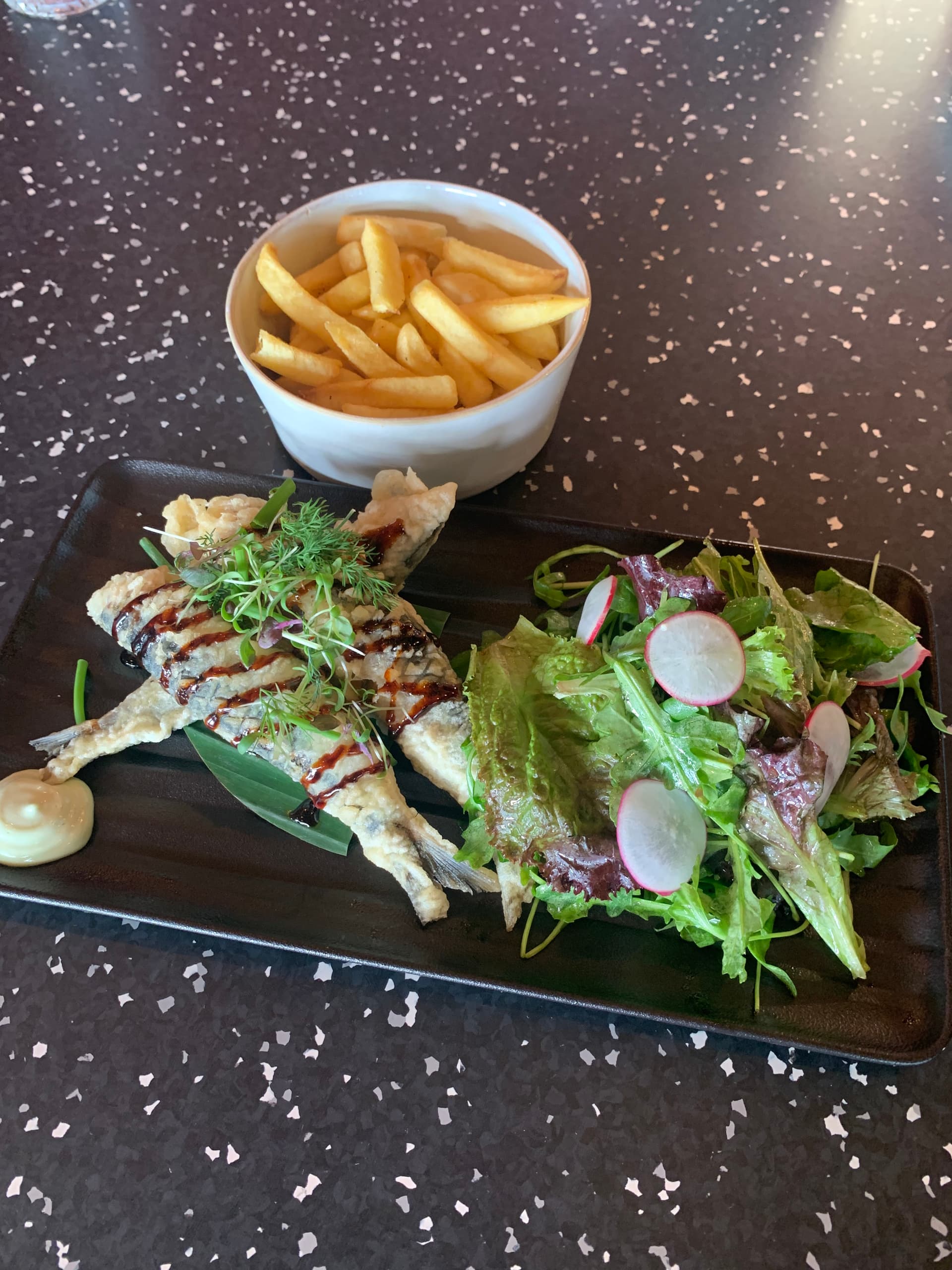 <p>Fried sardines, autumn salad, eel fish sauce &amp; fries</p>