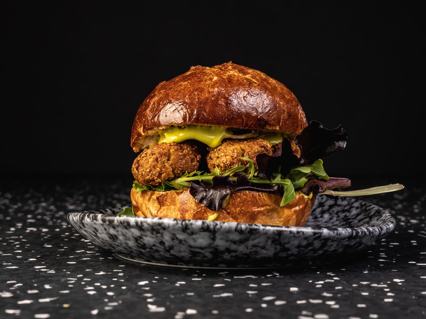 <p>Japanese milk bread, falafel, tahini, ramson mayonnaise, rocket salad, tomato and pickles</p>