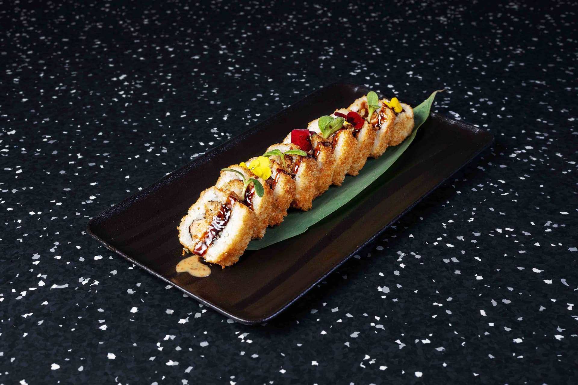<p>Fresh crab meat and salmon maki with crispy shrimp tempura</p>
