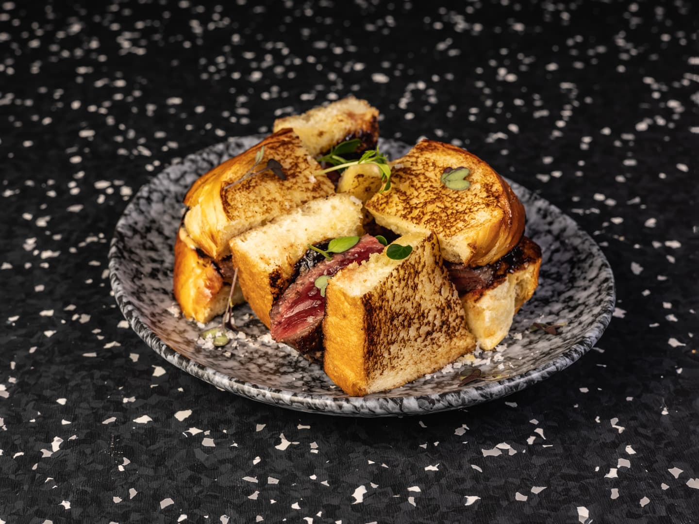 <p>Japanese milk bread, Wagyu beef, red onion jam and sriracha mayonnaise</p>