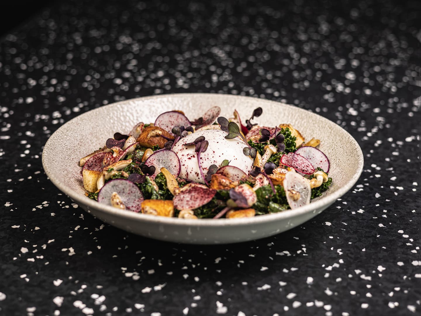 <p>Marinated green kale, Shimeji mushrooms, herb croutons, mustard sauce, hibiscus and Luxembourgish burrata</p>