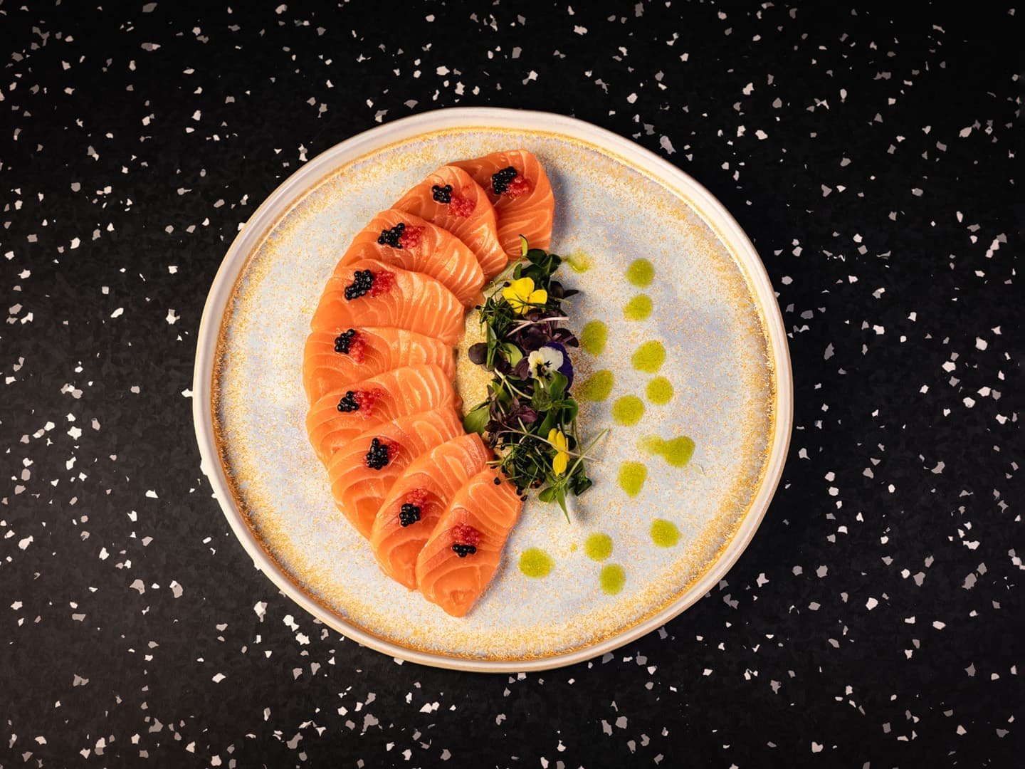 <p>Salmon sashimi, herring caviar, citrus</p>