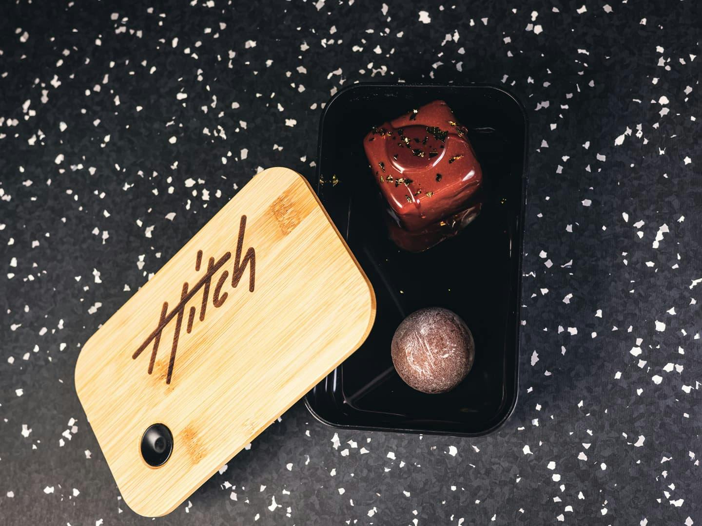 <p>Glazed chocolate mousse cube with mocchi&nbsp;</p>