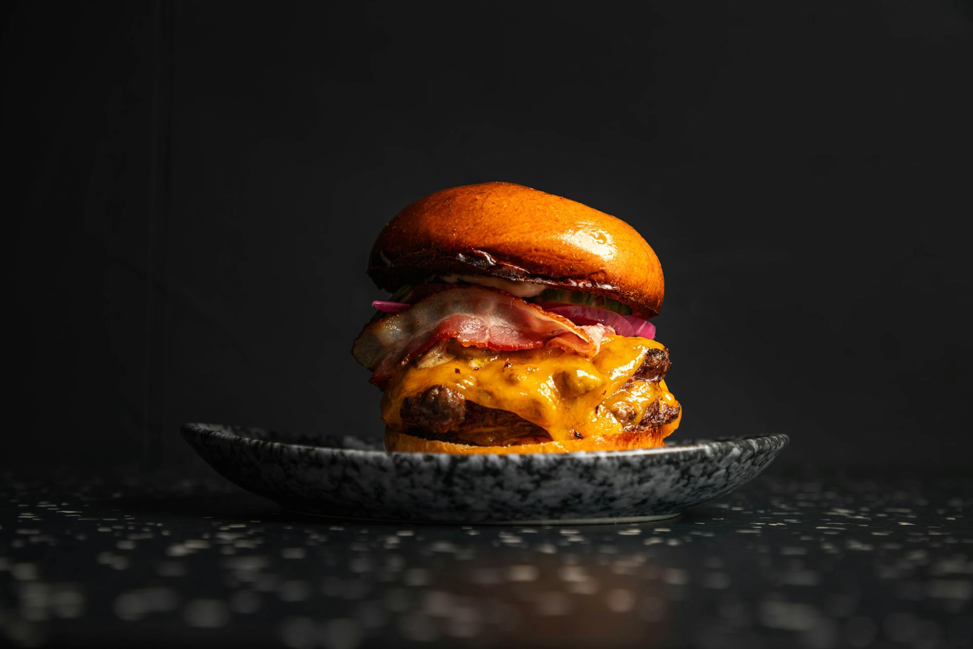 <p>Japanese milk bread, A5 Wagyu &amp; Luxembourgish beef patty, bacon,&nbsp; mayonnaise, marinated mushrooms, cheddar cheese</p>